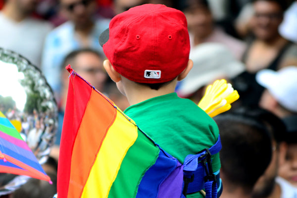 kid at pride parade, DEI for parents, DEI parenting hack